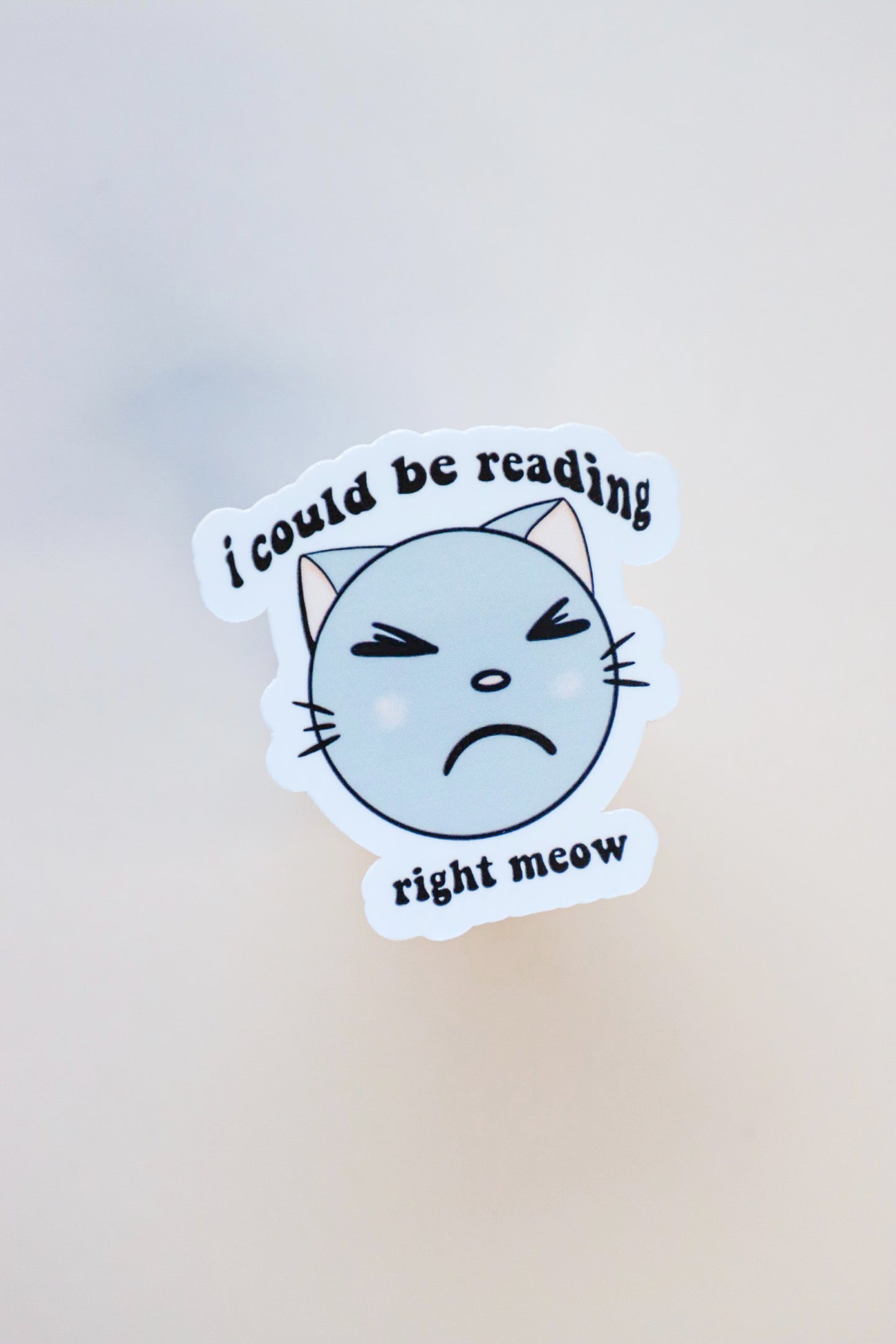 I Could Be Reading Right Meow Sticker